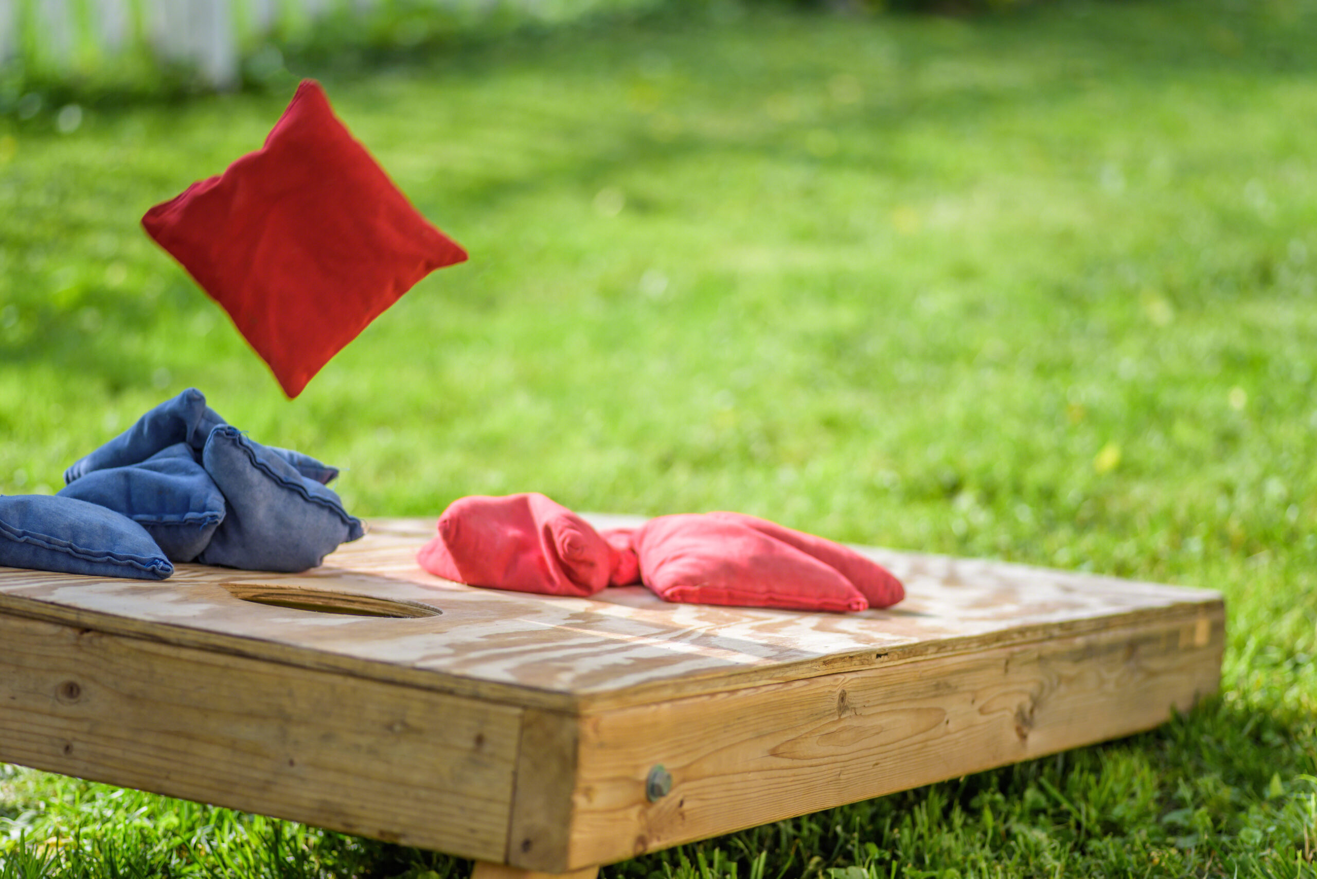 Playing cornhole game